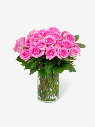 24 pink roses with vase included