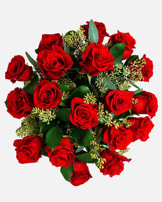 One and half dozen premium red roses in a stylish vase, a timeless gift for anniversaries.